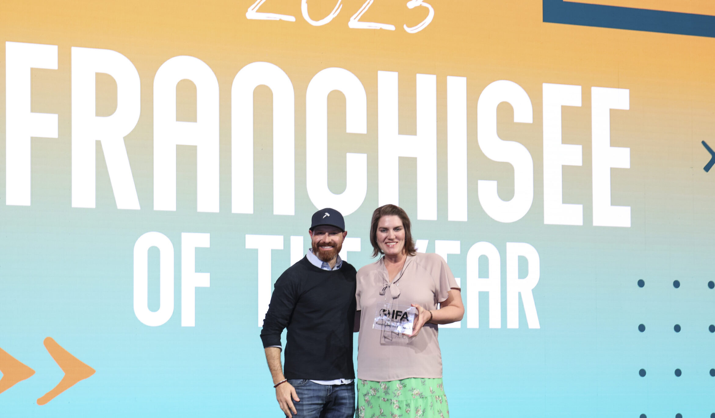 2023 Franchisee of the Year Award Katie Edge of Renovation Sells San Antonio and Michael Valente